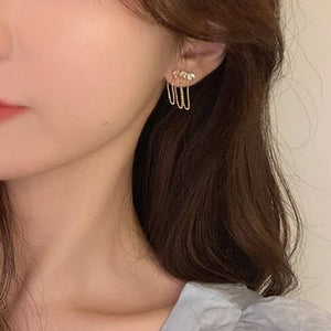 Elegante Ohrringe mit Zirkonia und Quaste