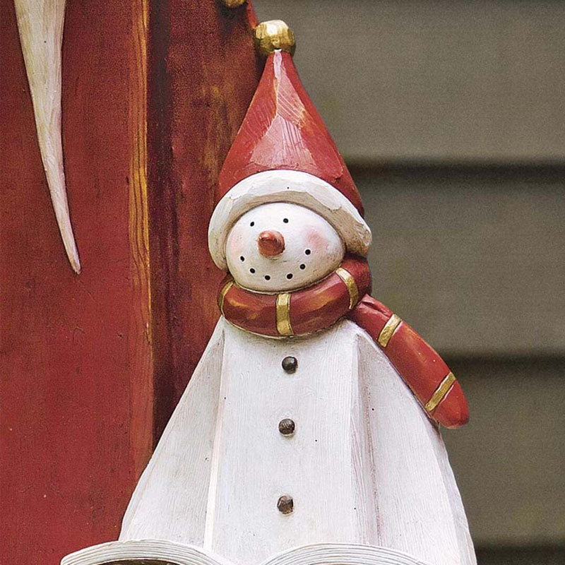 Weihnachtsmann- und Schneemann-Skulptur