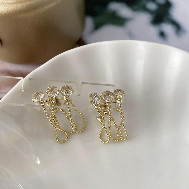 Elegante Ohrringe mit Zirkonia und Quaste