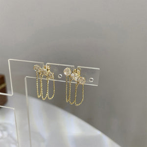 Elegante Ohrringe mit Zirkonia und Quaste