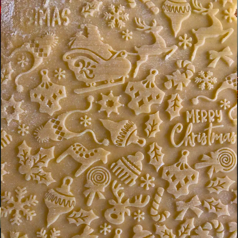 Nudelholz mit Weihnachtsmotiven